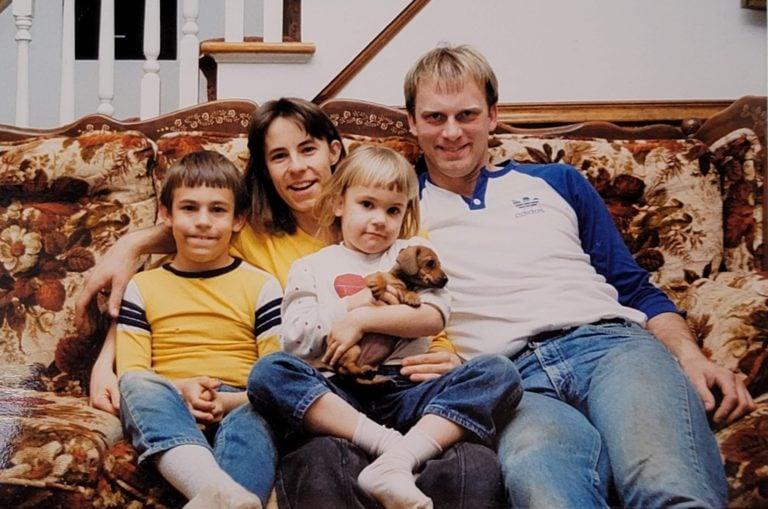Young Stephanie with her family and their beloved dachshund, showing early exposure to dogs that sparked her passion for breeding